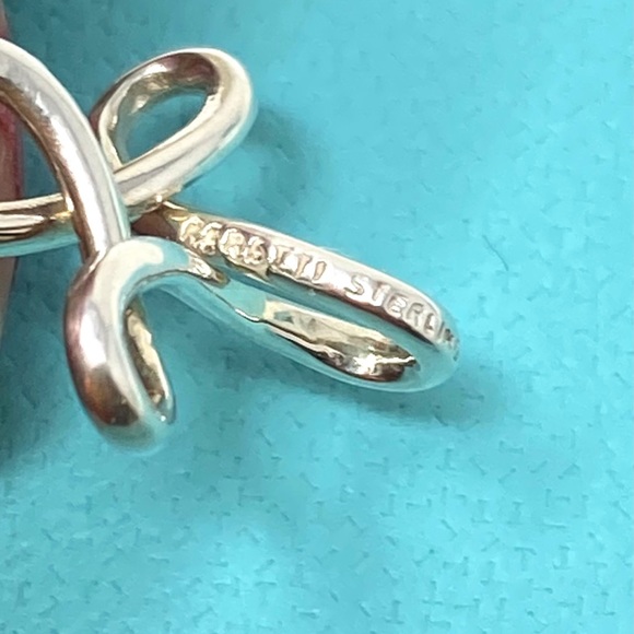 - AuthenticTiffany & CO. Elsa Peretti Infinity Cross Pendant Necklace. - Picture 4 of 11